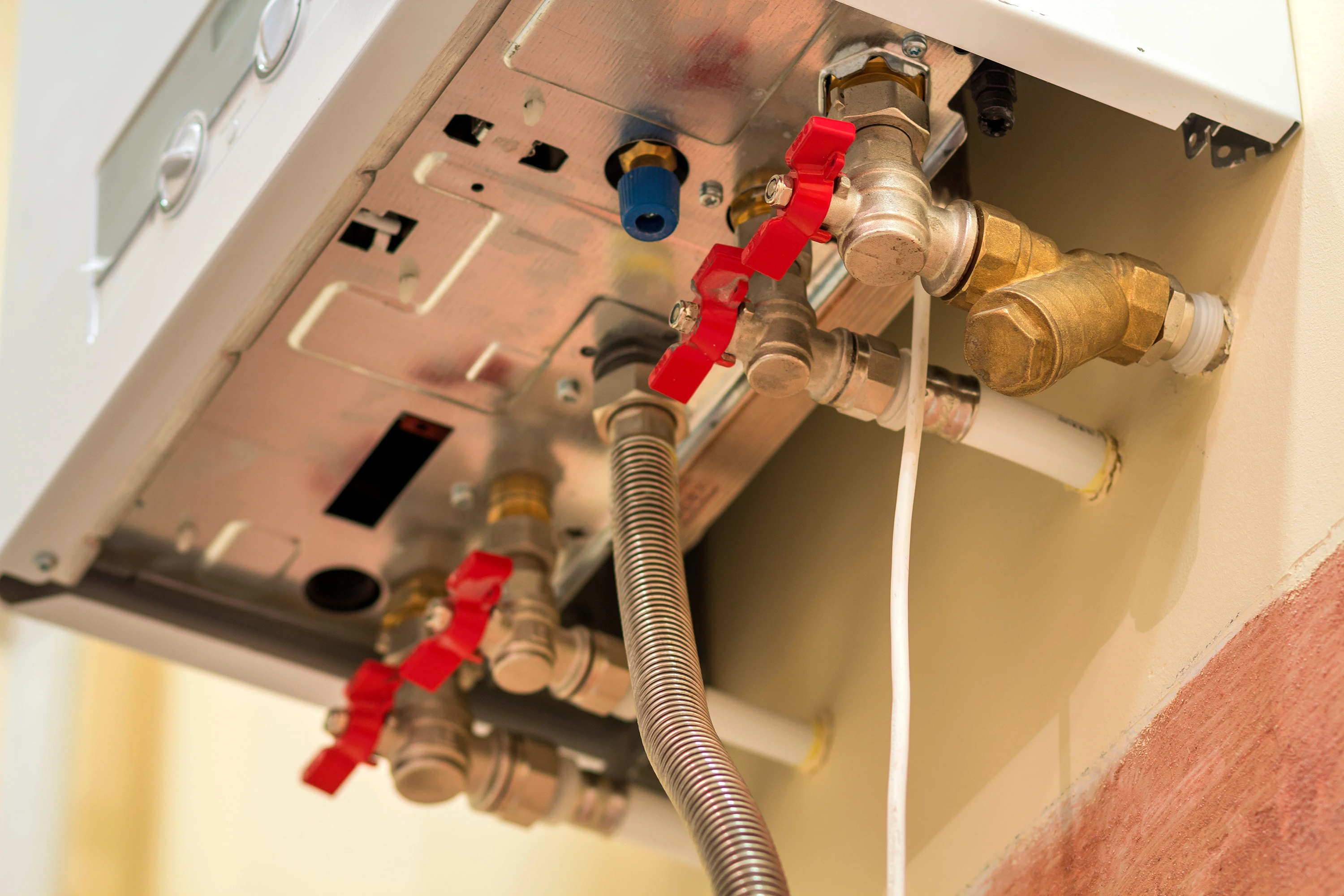 A modern, wall-mounted boiler system after a professional installation by Air Dynamics in Tulsa.